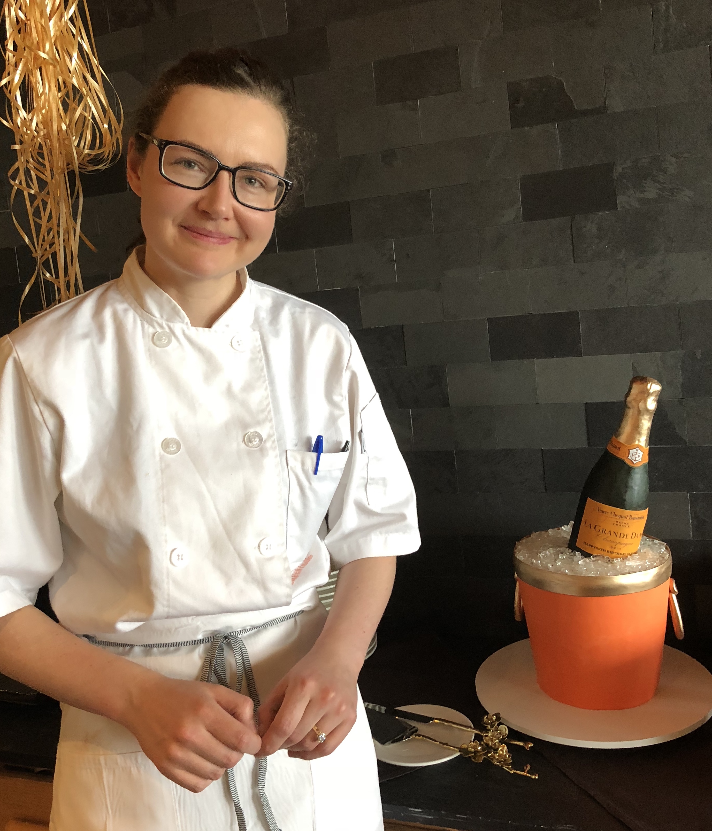 Carla Schier with Veuve Clicquot cake.jpg